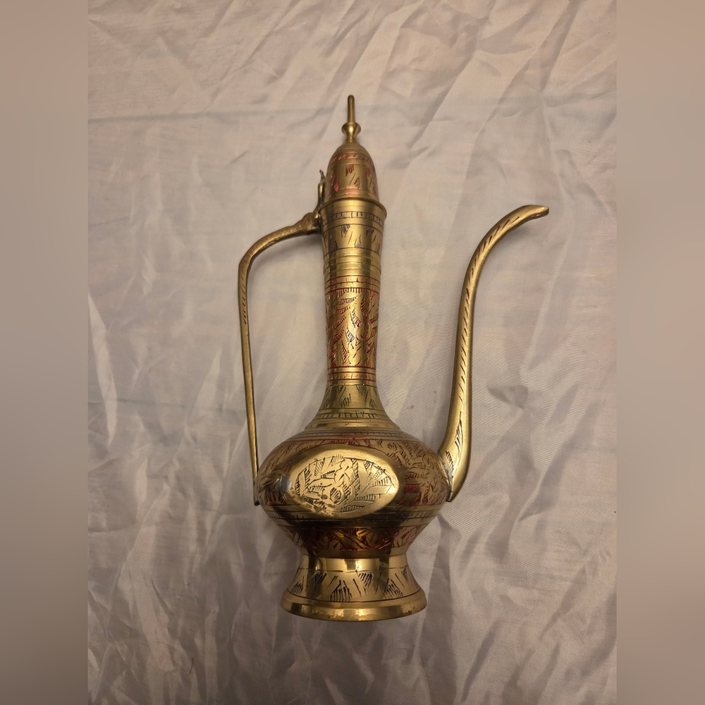 Intricate Brass Pitcher with Red Accents